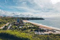 Anglet, known as "La Petite Californie", View of the beaches, the ocean, the Biarritz lighthouse and the beach of Petite Chambre d'Amour, Basque Country, New Aquitaine, France